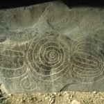 Thumbnail of http://Knowth%20kerbstone%205%20(spiral%20in%20centre%20with%20crescents)