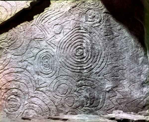 Decorated roof slab in right recess of Newgrange chamber