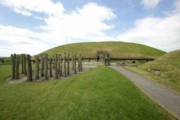 Eastern view of Knowth Mound with reconstructed timber circle