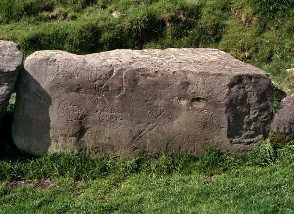 Dowth kerbstone 51 with seven sun like carvings
